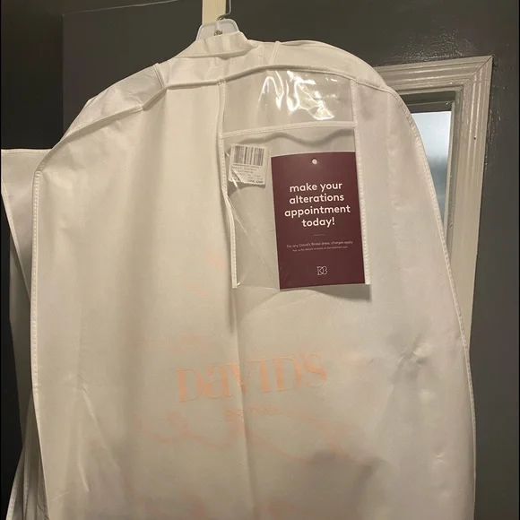 Brand New, Never Worn/Altered Size 16 Ivory David’s Bridal Wedding Dress.